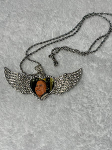 Winged heart necklace